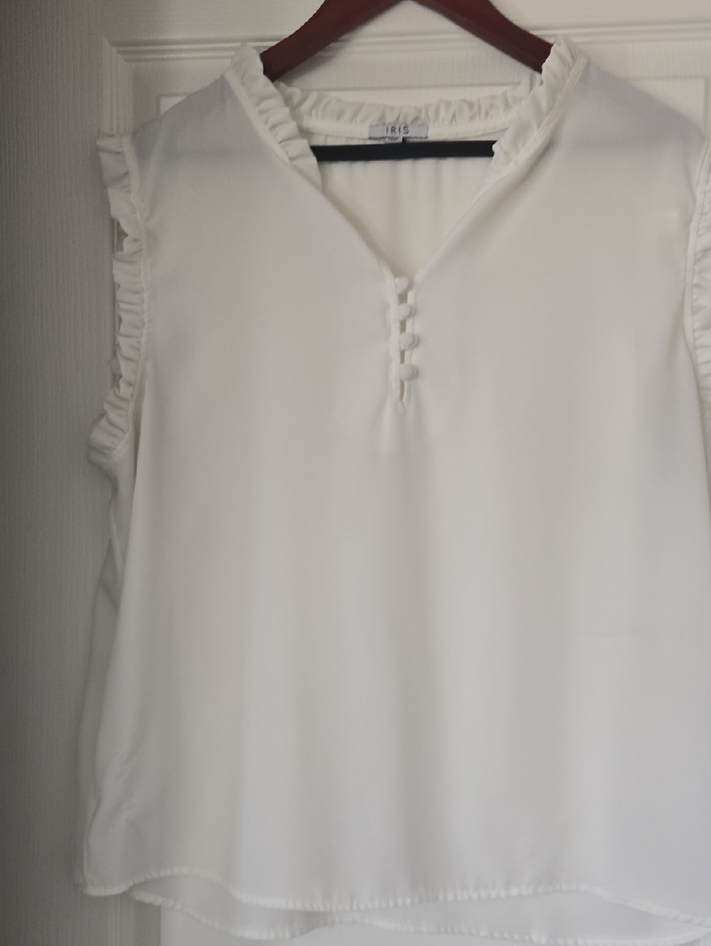 iris Ivory Ruffle-Trim Sleeveless Blouse